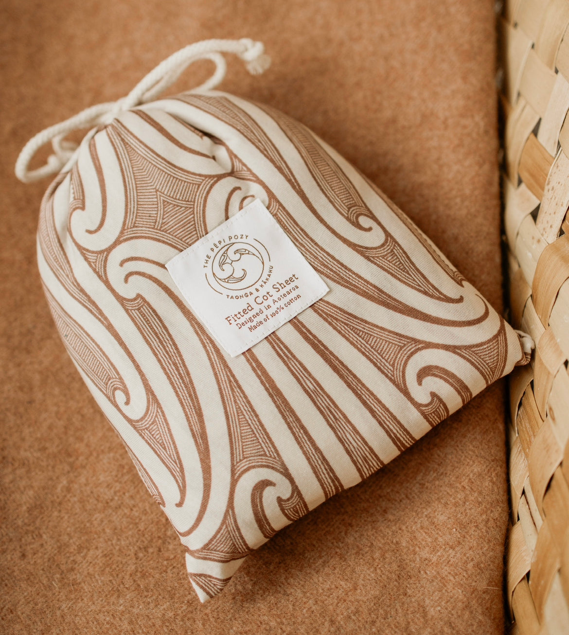 Manaaki Cot Sheet - Parauri