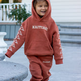 *Pre-order* Kaitiaki Tamariki Tracksuit - Rust